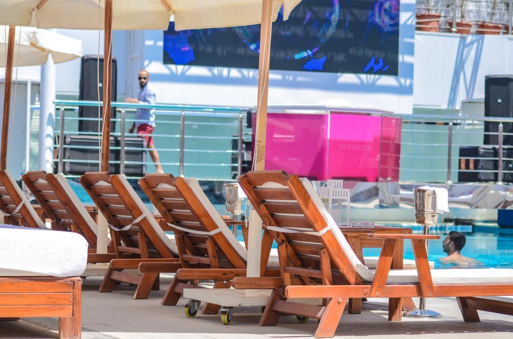Sun City Hotel - The Gabriel Kairo Exterior foto A row of lounge chairs on a cruise ship